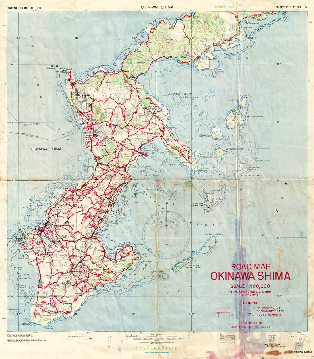 (WWII Japan- Okinawa) Road Map Okinawa Shima - Scale 1:100,000 ..., U.S Govt., 1945 A rare "CONFIDENTIAL" sheet for the lower half of the war town island. As noted the red ink was "Overprinted By Engr. Sec. X Army - 21 June 1945" and shows the "Primary Roads", "Secondary Roads", and "Route Numbers". Noted as "Advance Copy" at the top right. Condition is fair with soiling and staining.
